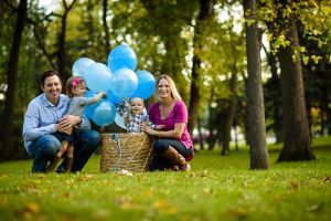 Fall family portrait with kids and balloon