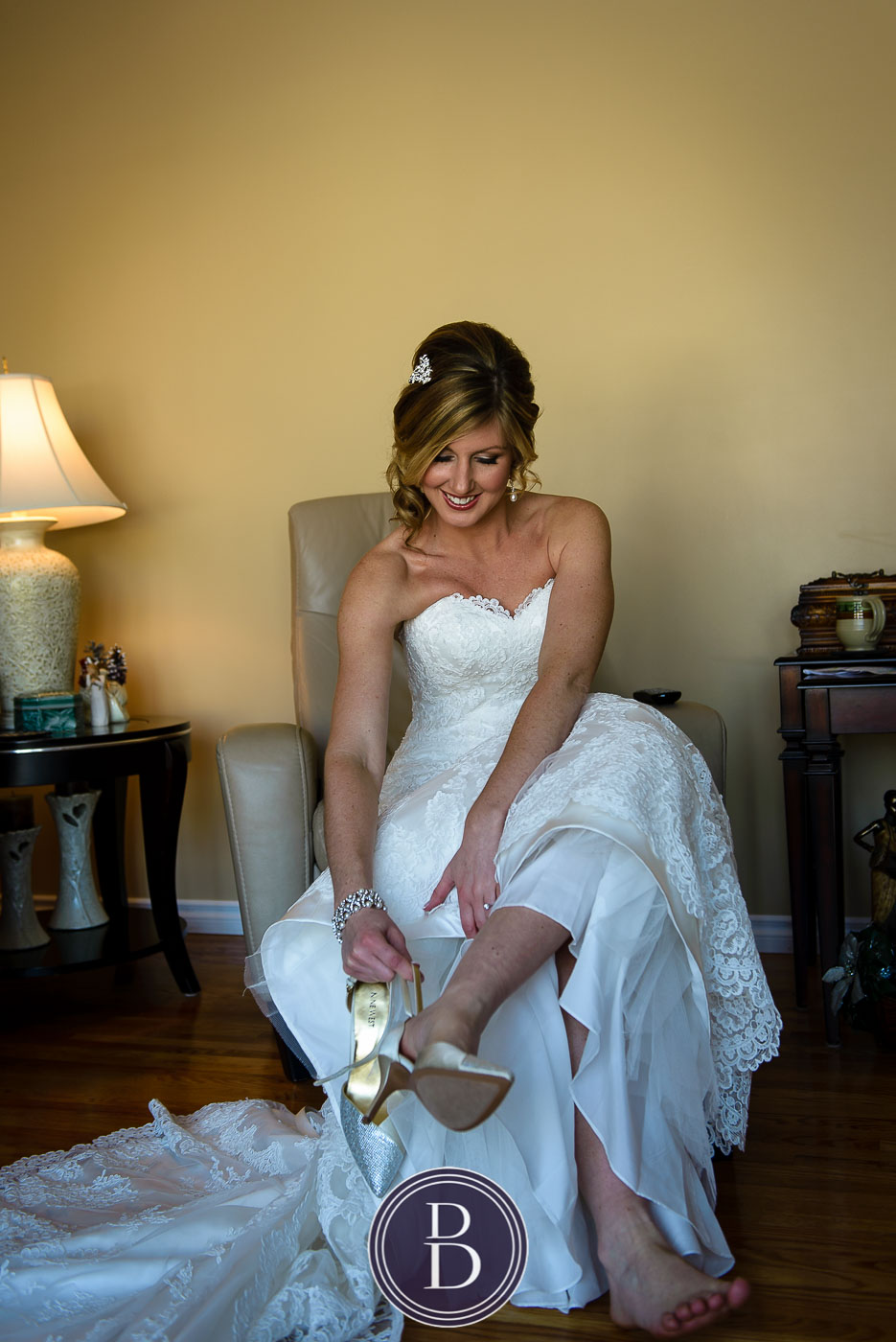 Bride with smiles getting ready for winter wedding