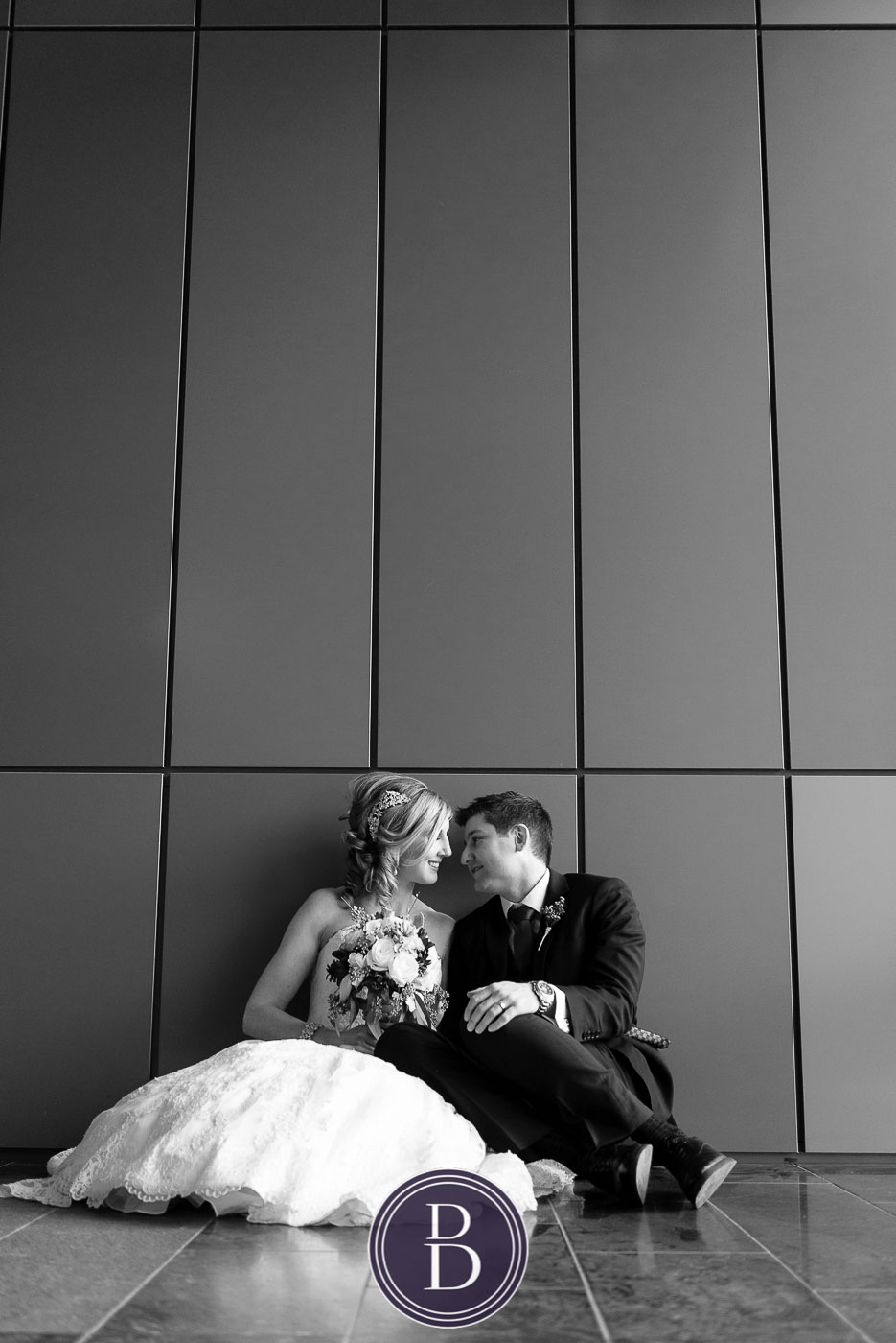 Modern bride and groom love portrait Hydro building