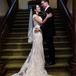 Bride and groom on stairs