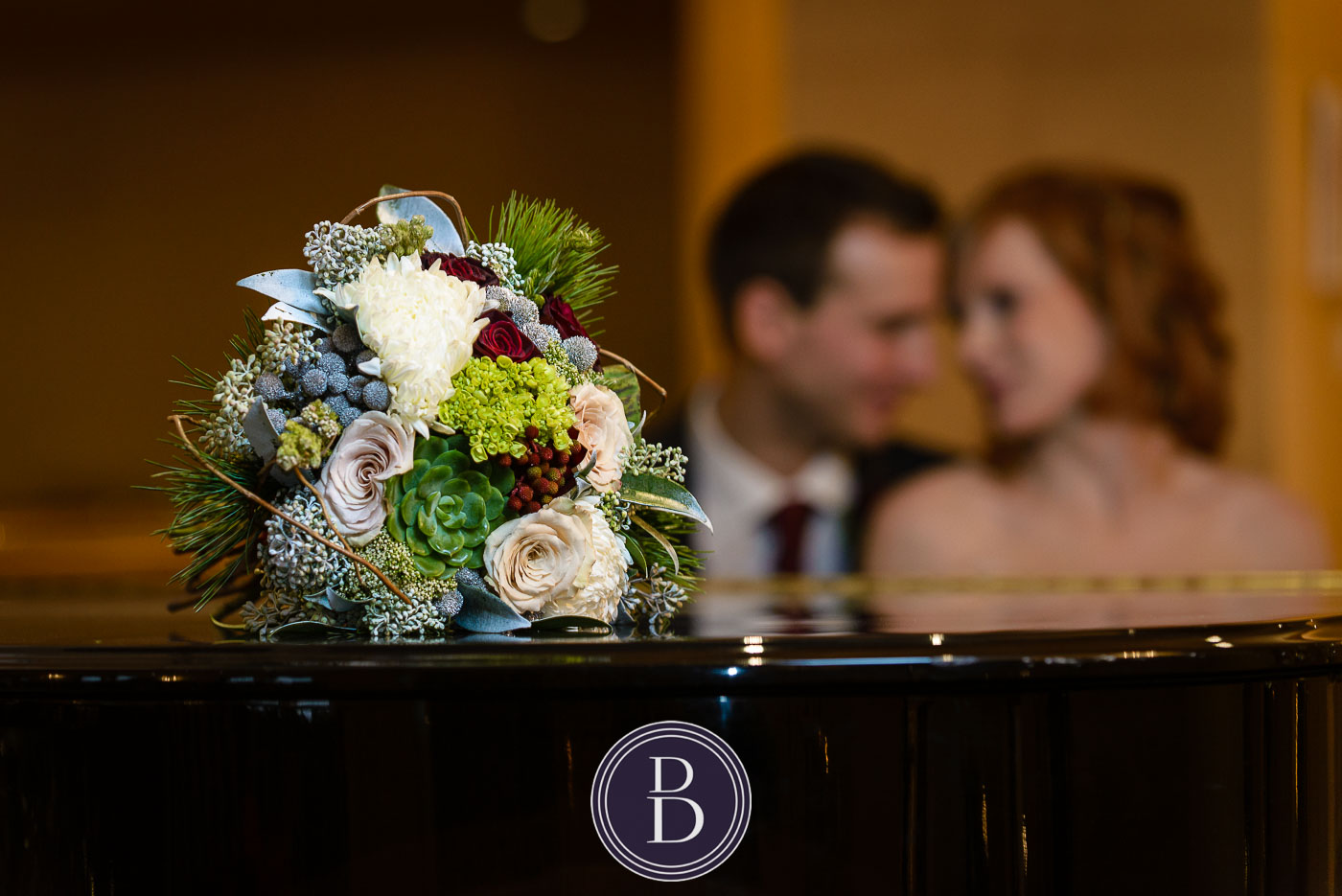 bridal bouquet with bride and groom