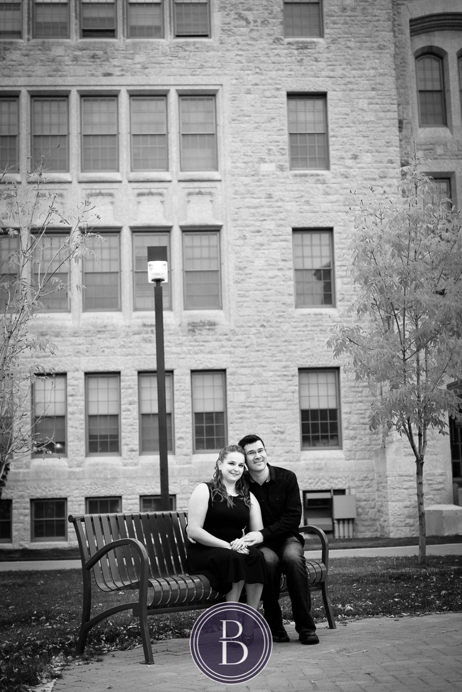 engagement photos sitting on a bench