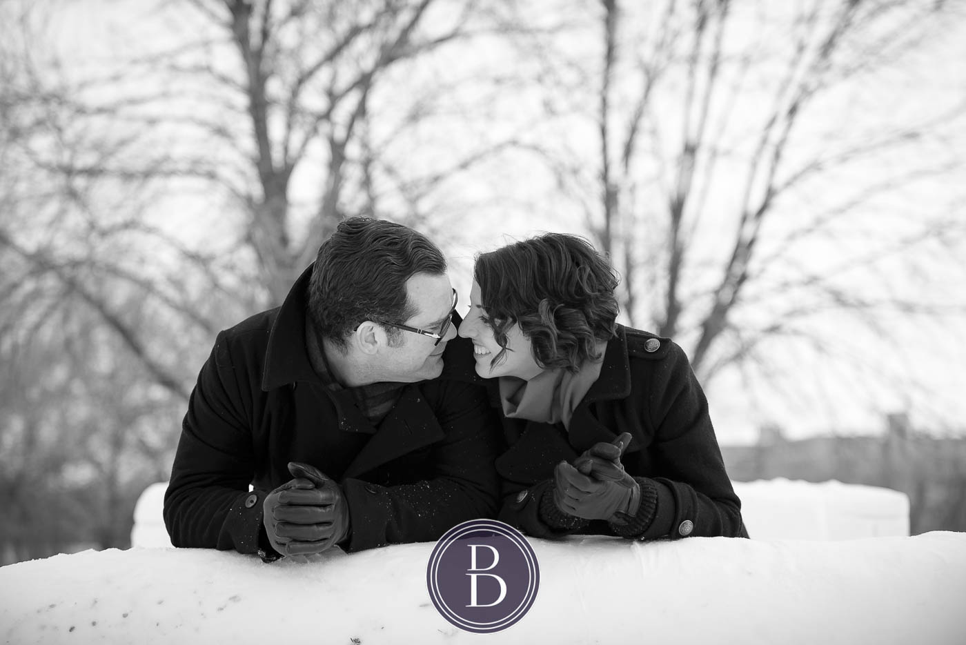 winter engagement session couple looking into each others eyes The Forks Winnipeg