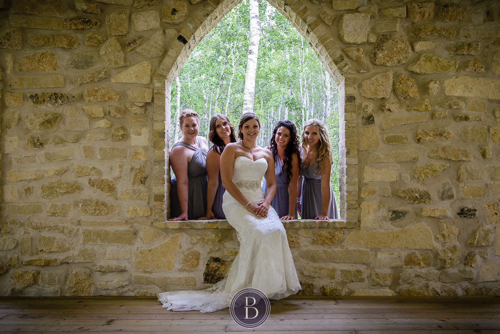 bride and girls portrait stone window