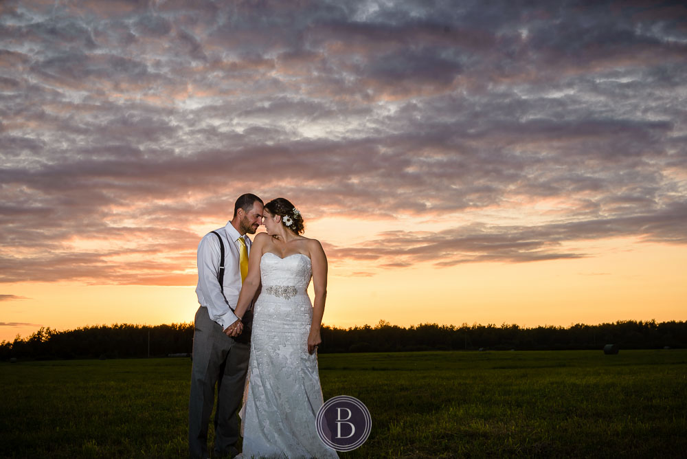 Wedding bride groom sunset portrait