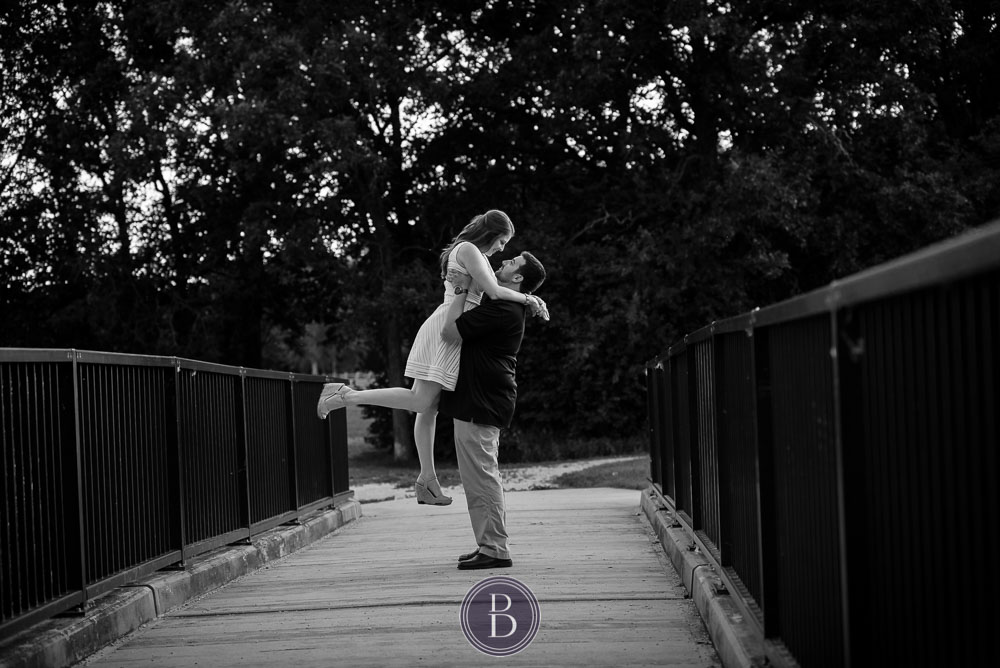 couple in love on a bridge engagement photography