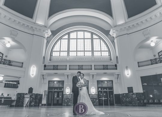 Winnipeg wedding photos of beautiful couple. Wedding reception took place at Fort Garry hotel in Winnipeg. Roman Catholic wedding ceremony took place at Holy Ghost Church. Bride and Groom wedding portrait at train station