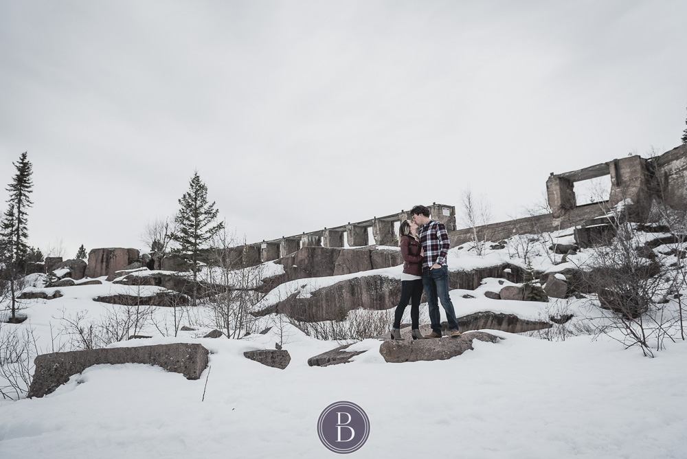 Winter engagement photos engaged to be married couple holding each other