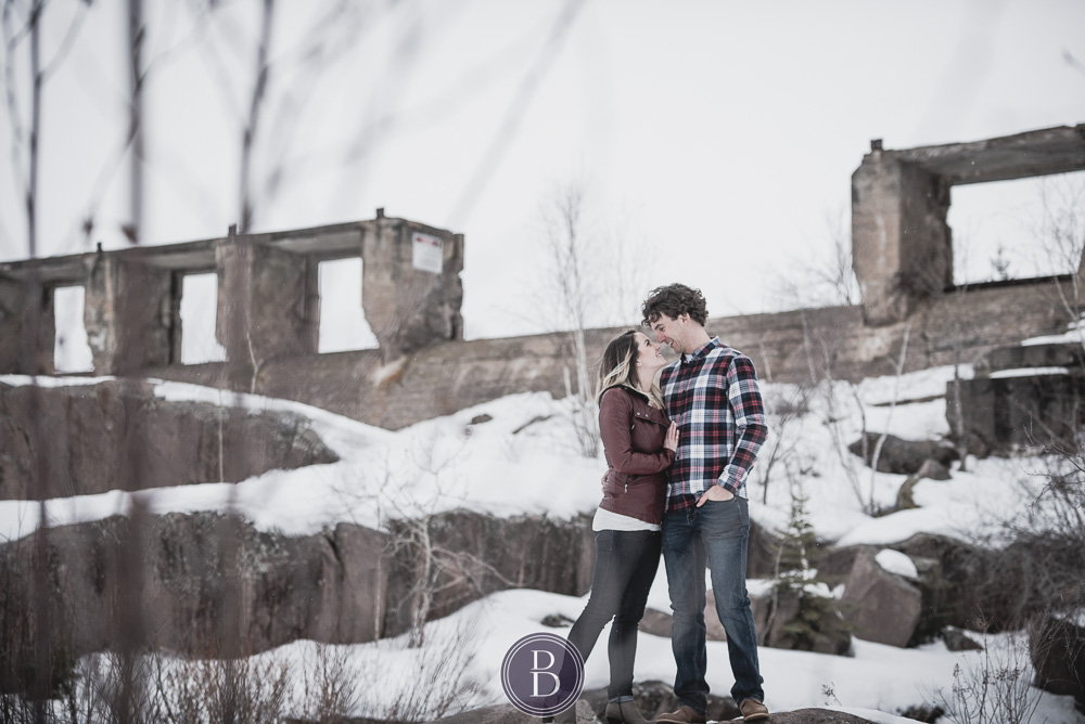 Winter engagement photos at Pinawa dam couple in love