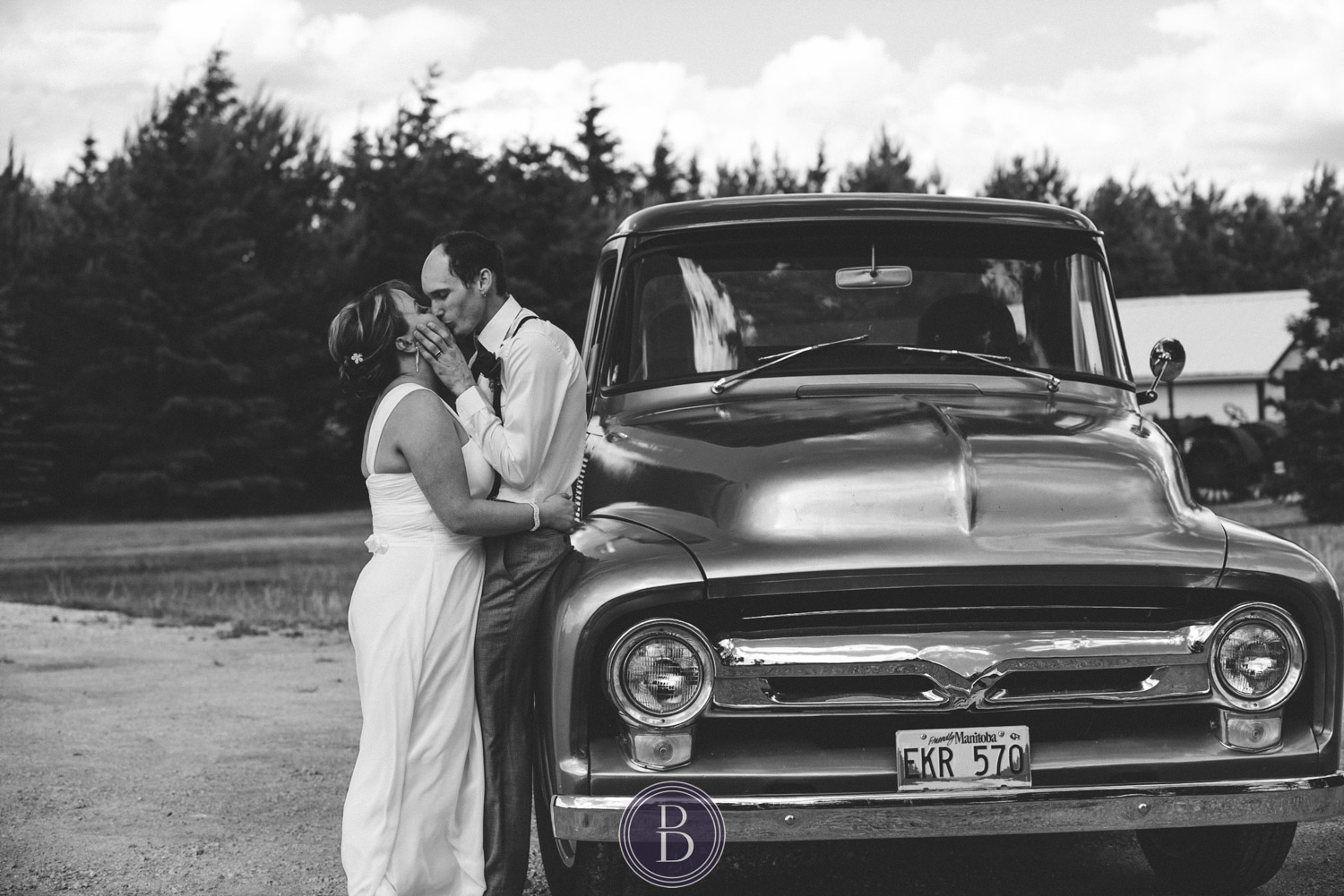 Beausejour Manitoba Wedding kiss by classic car