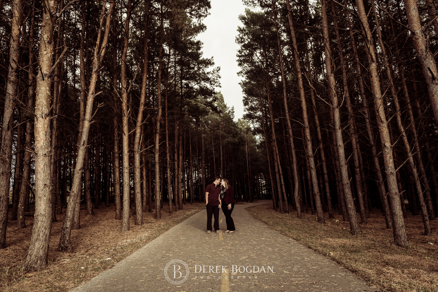 Birds Hill Park Engagement Session couple in trees