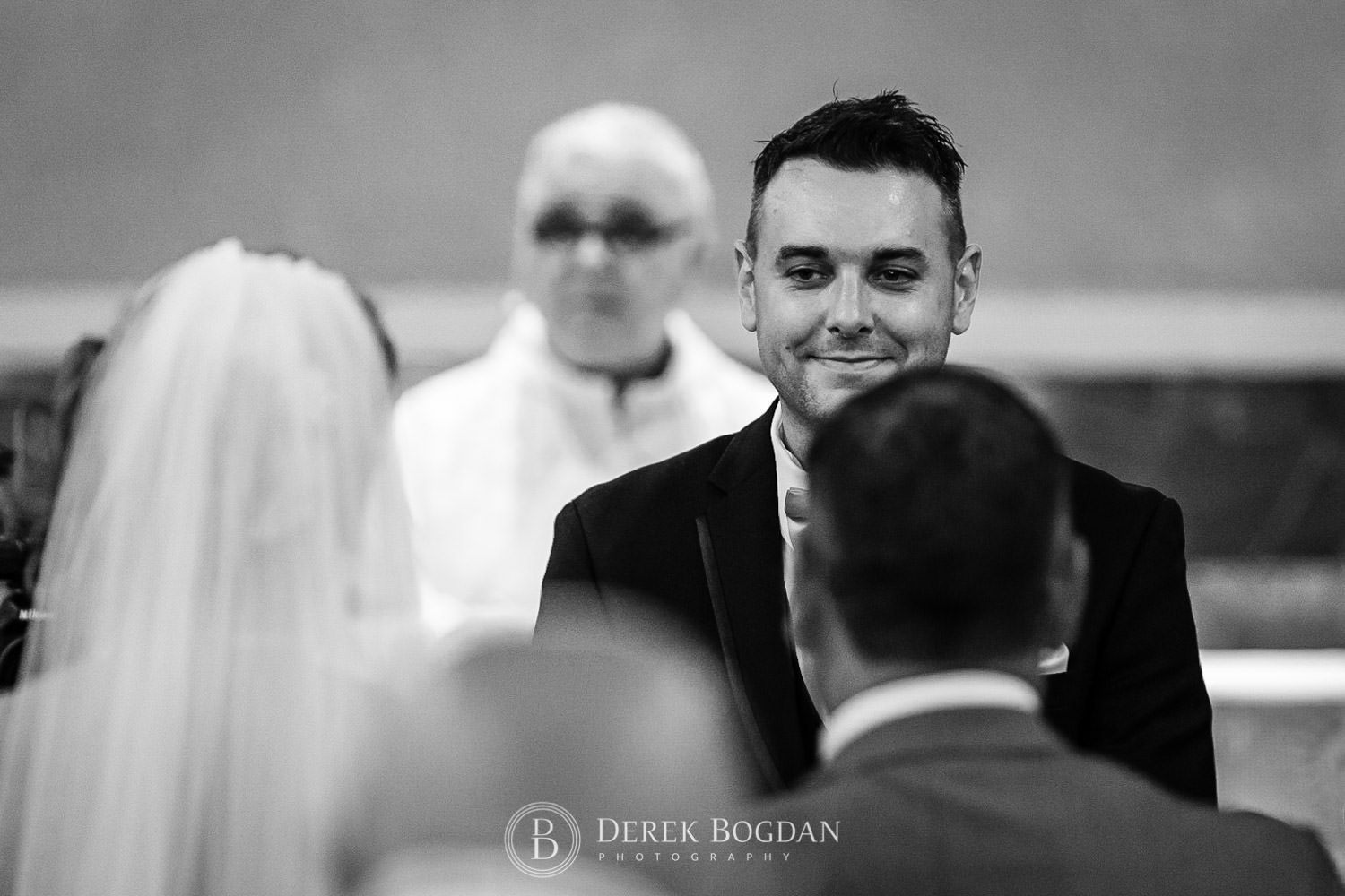 groom seeing bride walking down aisle