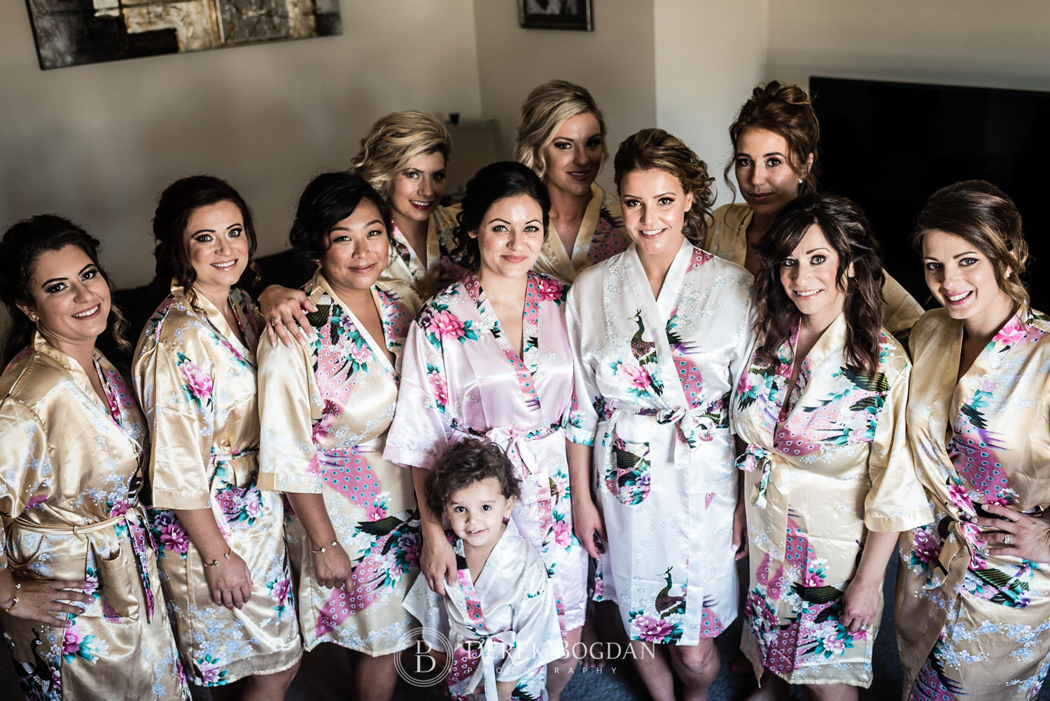 bride and bridesmaids portrait getting ready house coat