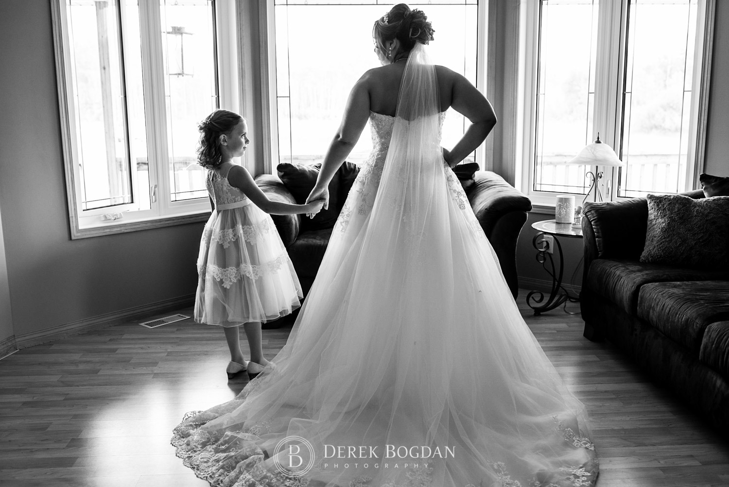 bride and flower girl dresses portrait getting ready