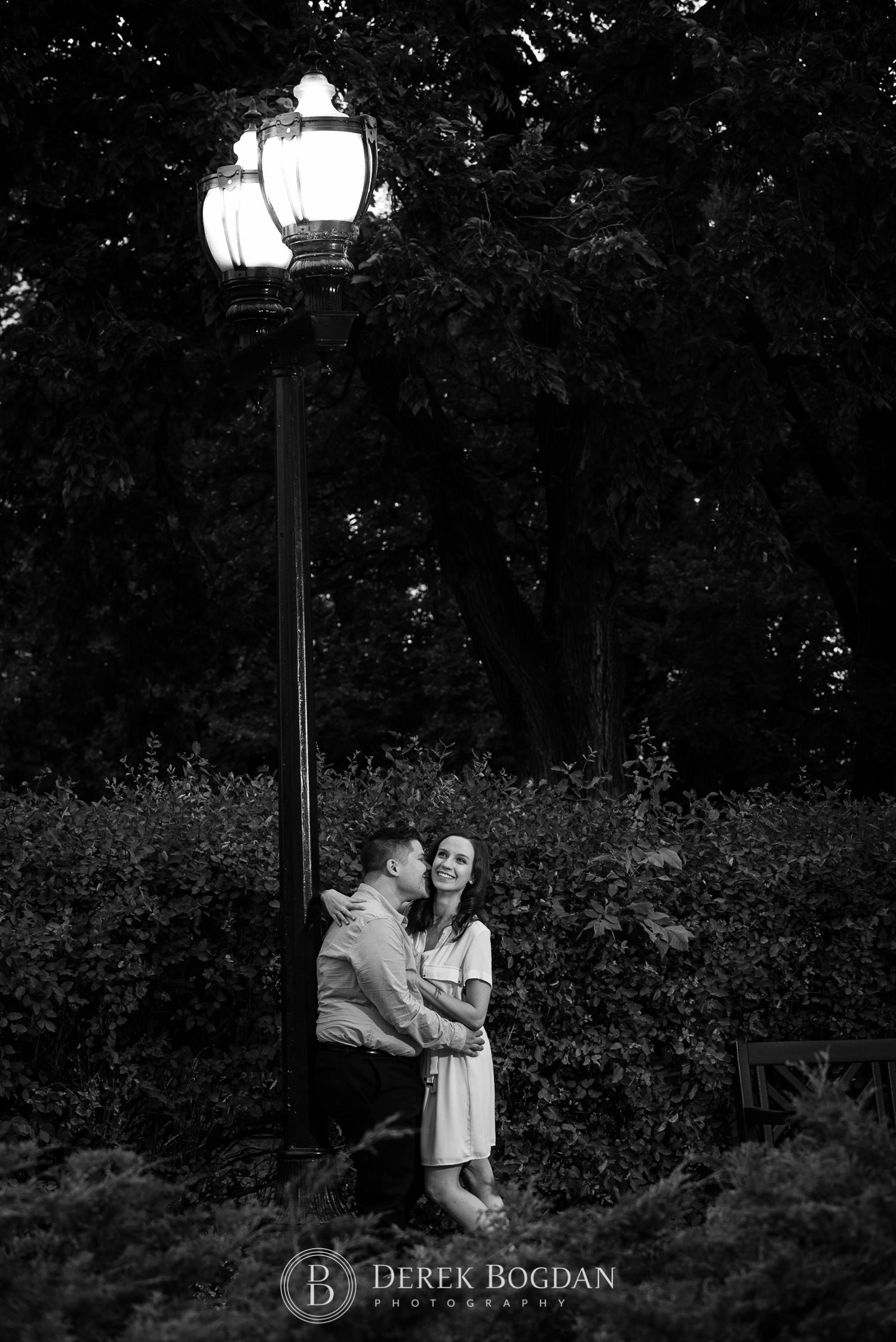 Romantic evening engagement session by light post