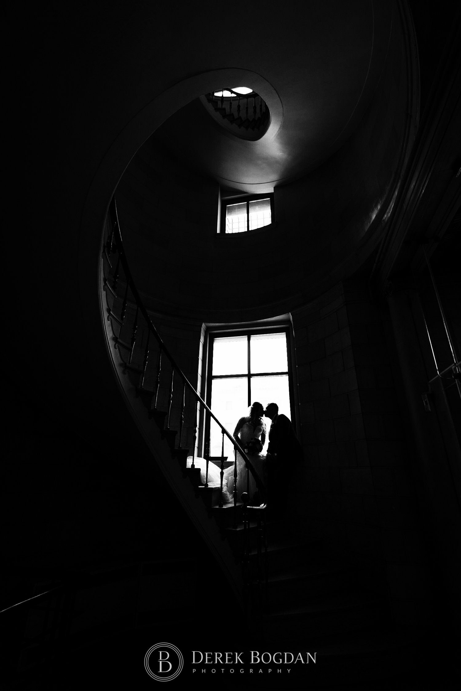 Bride and groom stairway Winnipeg wedding photography
