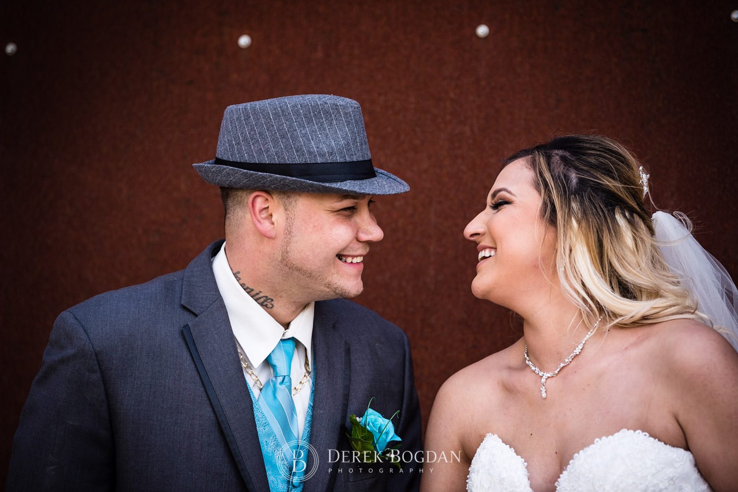 Winnipeg wedding portrait bride groom smiles Assiniboine Park Qualico Family Centre