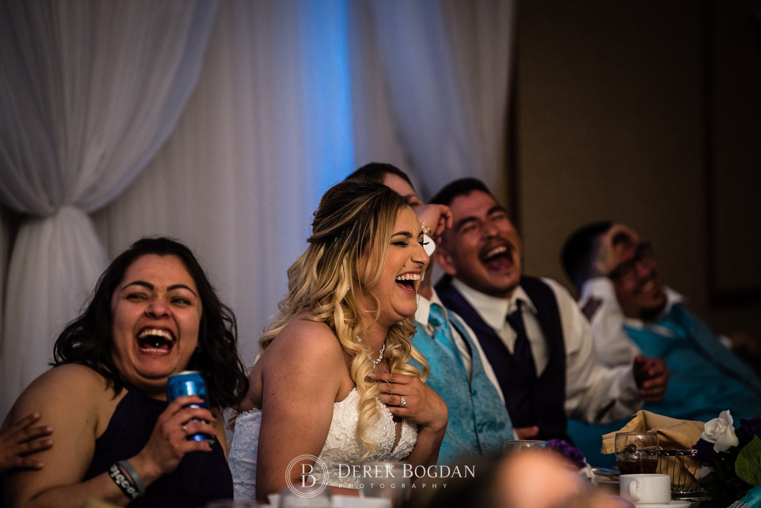Victoria inn Winnipeg wedding reception bride groom laugh
