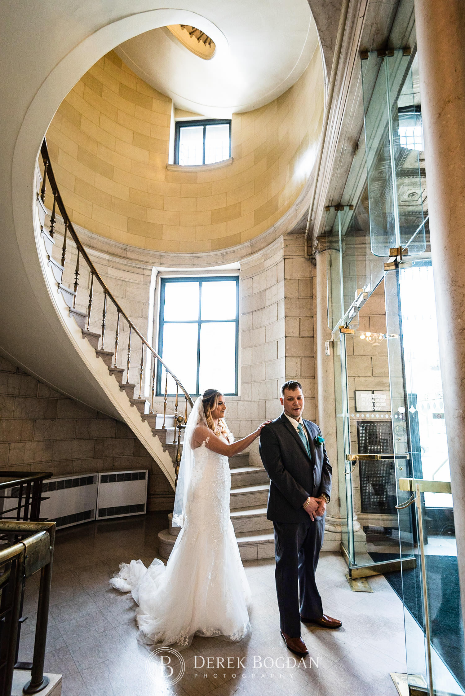 First look Hamilton building exchange district Winnipeg wedding bride and groom