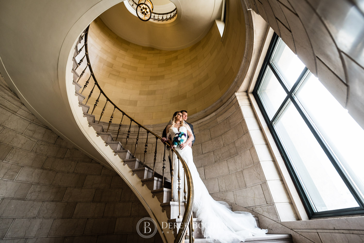 Bride and groom stairway Winnipeg wedding