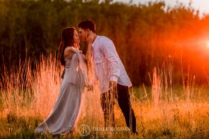 Winnipeg engagement photos at Assiniboine forest engaged couple in love sunset evening romance