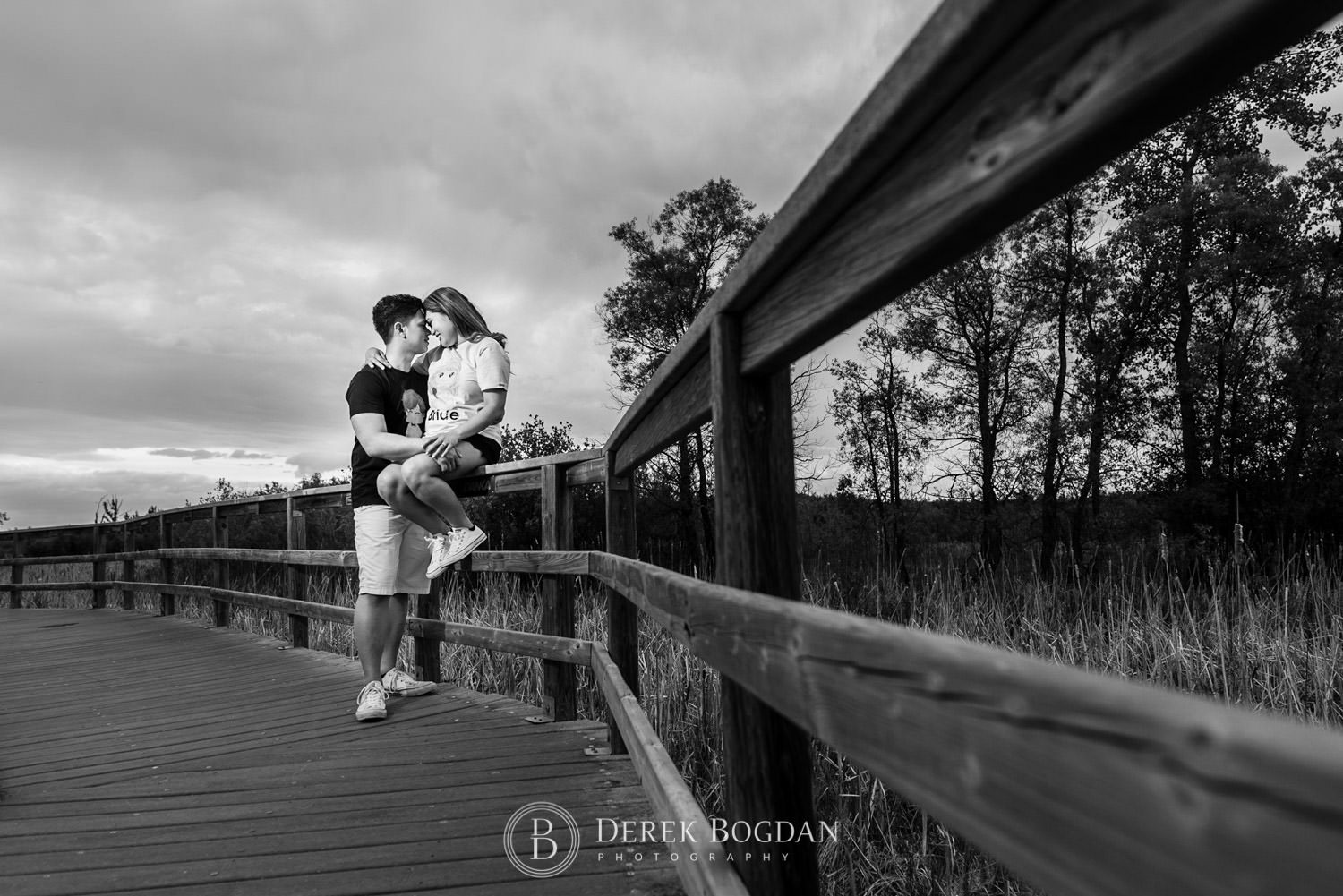 Winnipeg engagement photos at Assiniboine forest engaged couple in love hugs