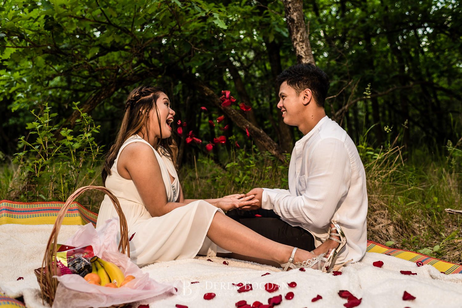 Winnipeg engagement photos at Assiniboine forest engaged couple in love picnic time