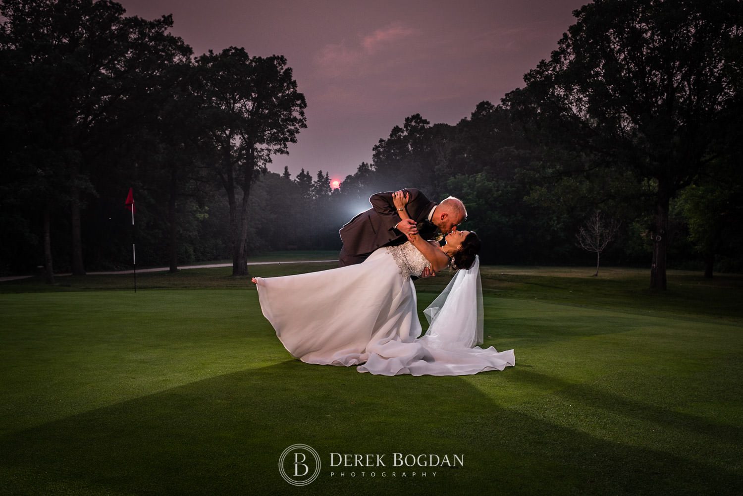 Bel Acres Golf Wedding bride and groom evening portrait golf course kiss