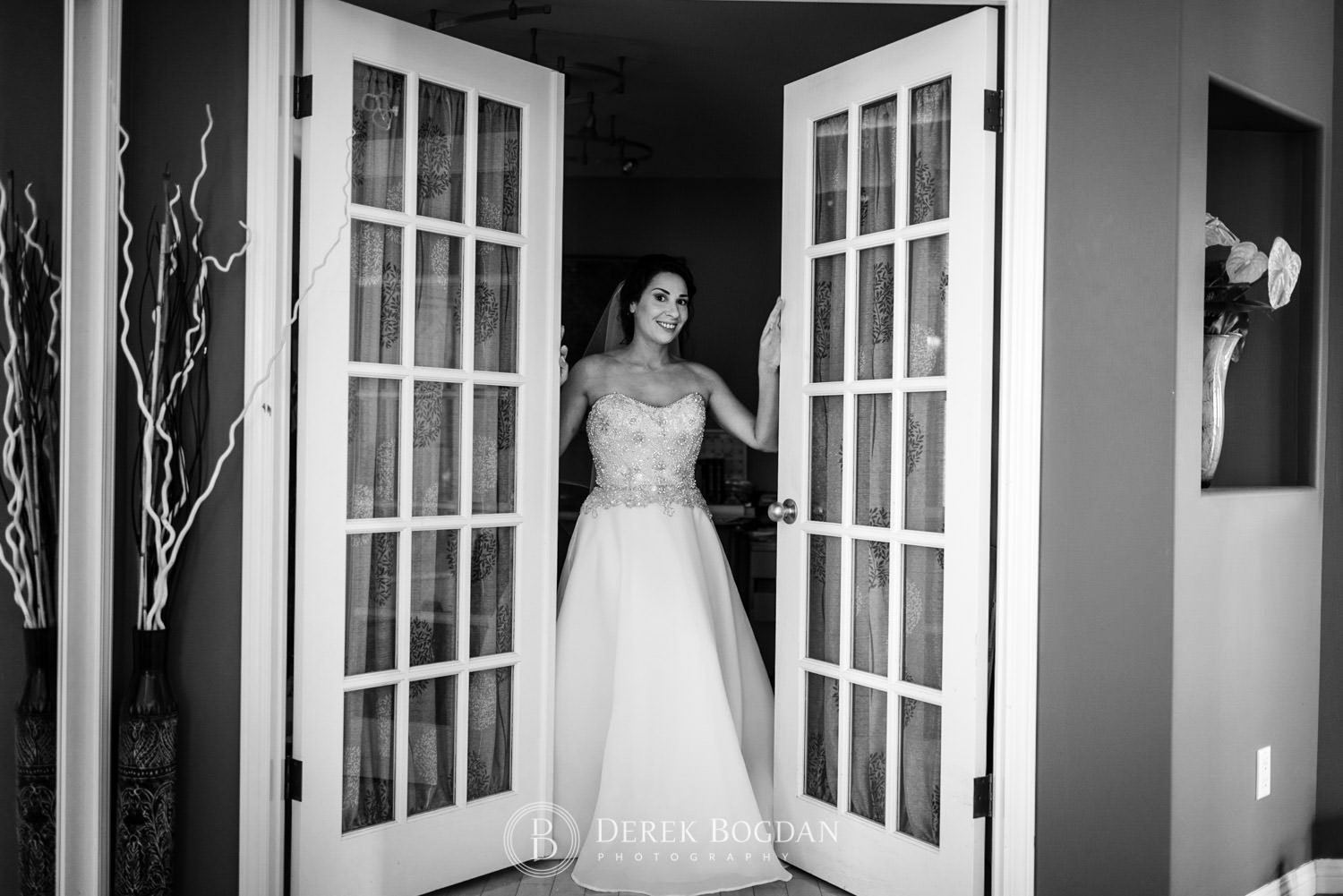 Bel Acres Golf wedding Manitoba bride getting ready portrait in home french doors