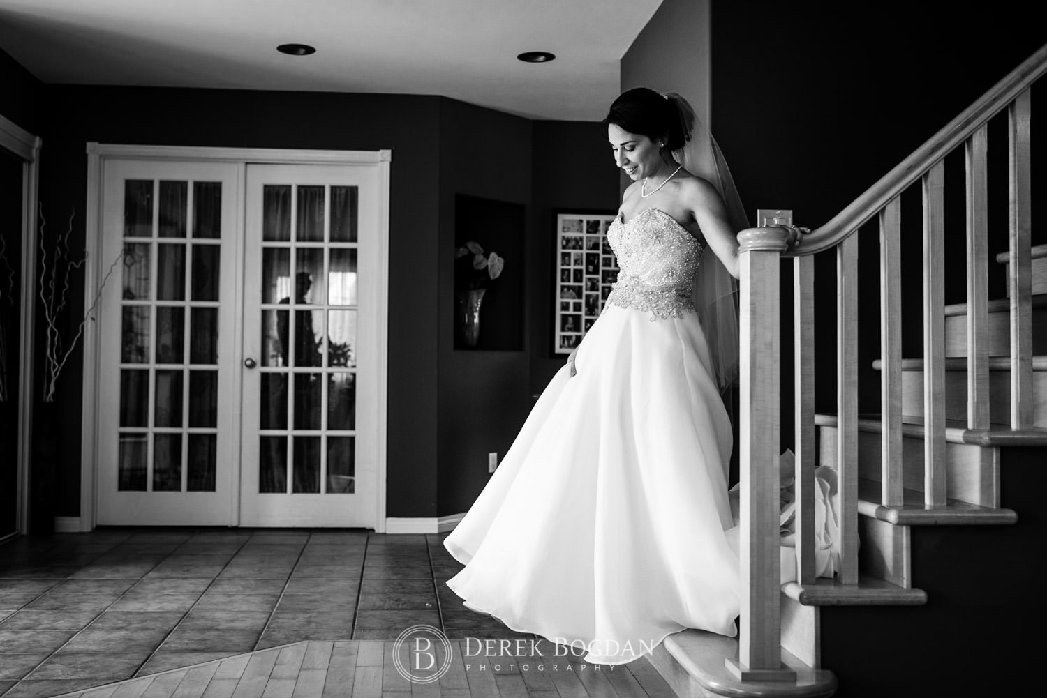 Bel Acres Golf wedding Manitoba bride getting ready walking down the stairs
