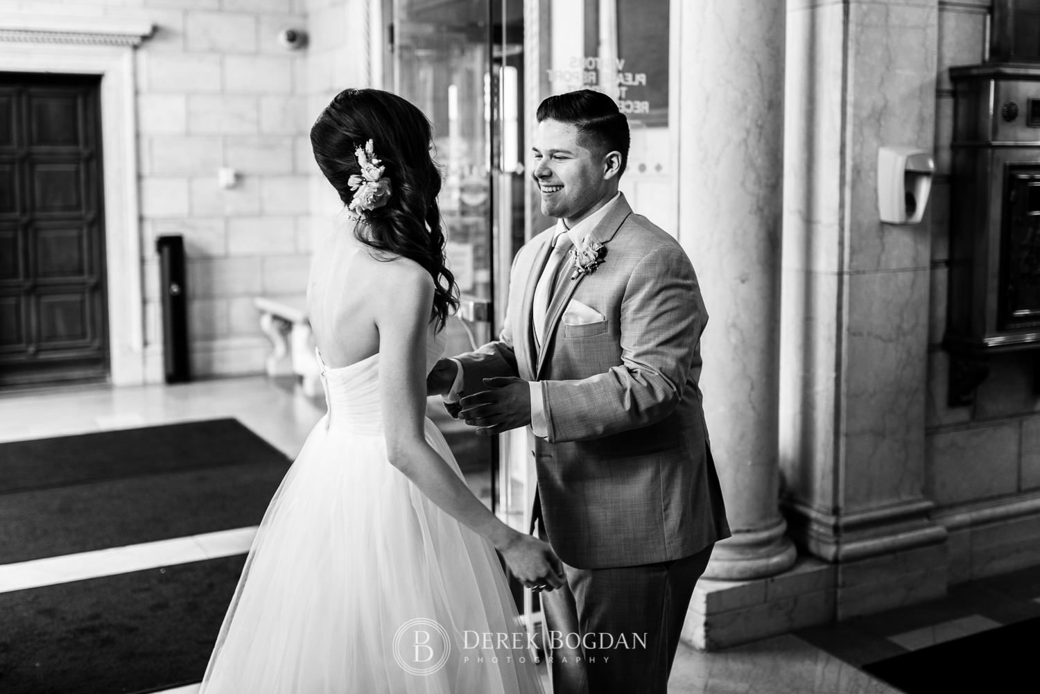 Groom sees bride first look wedding moment