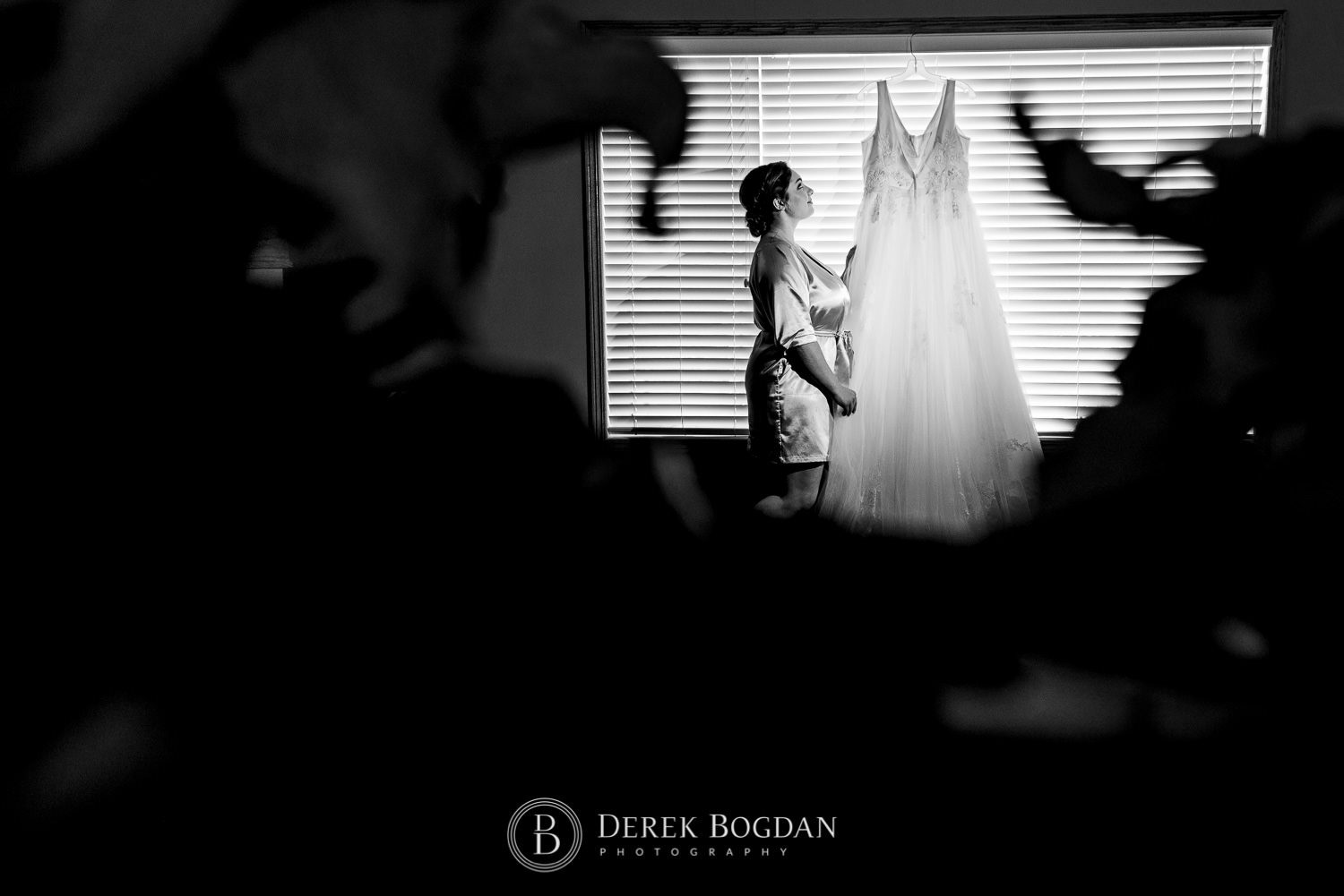 Bride looking at her dress