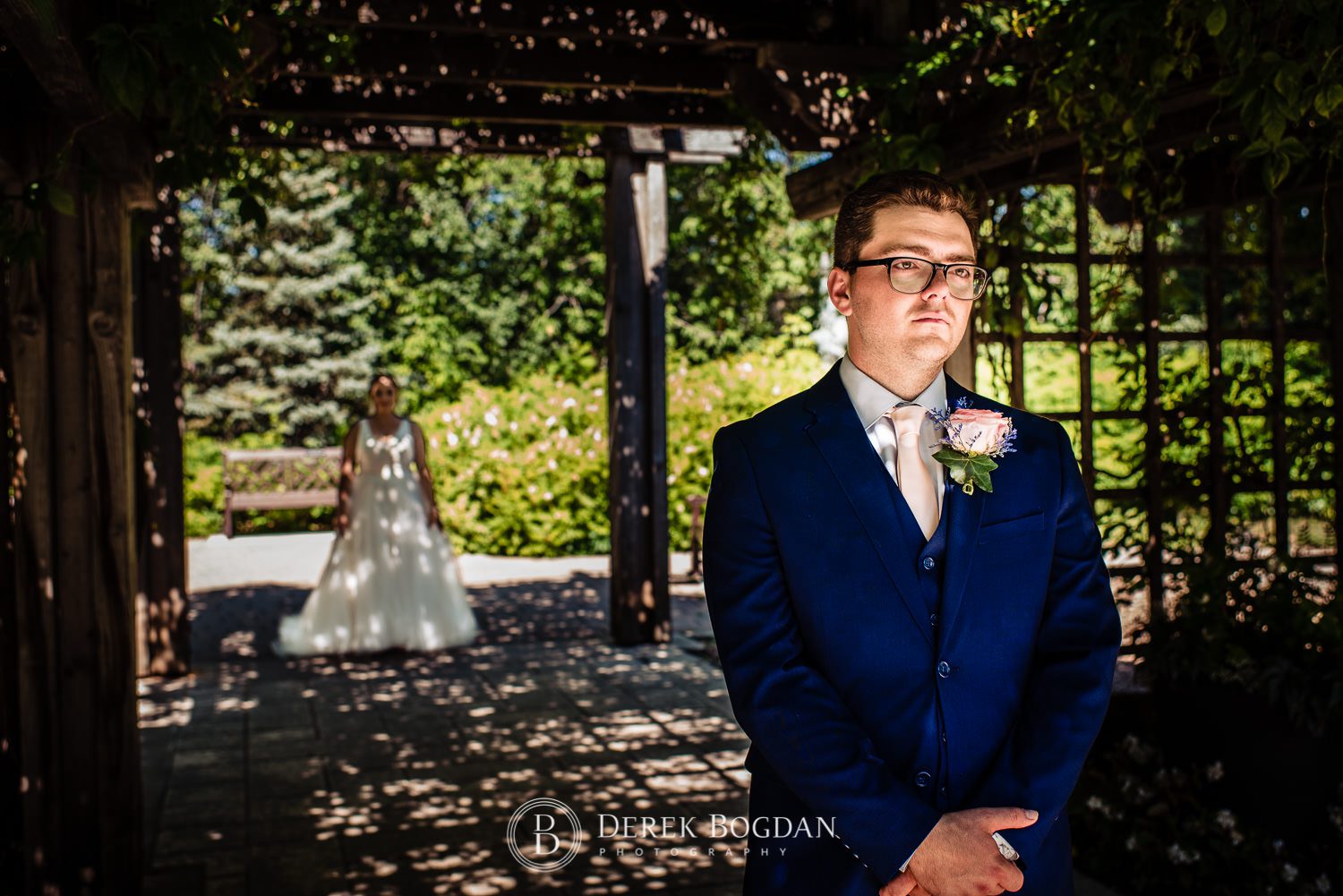 Groom and bride first look moment Assiniboine Park