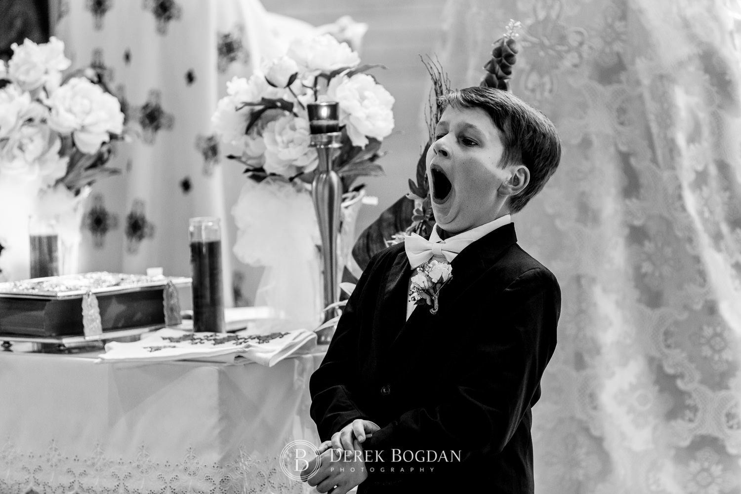 Ukrainian church wedding catholic ring bearer yawning Ukrainian church wedding