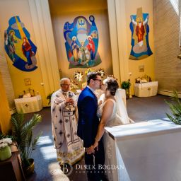Ukrainian church wedding catholic ceremony bride groom first kiss Ukrainian church wedding