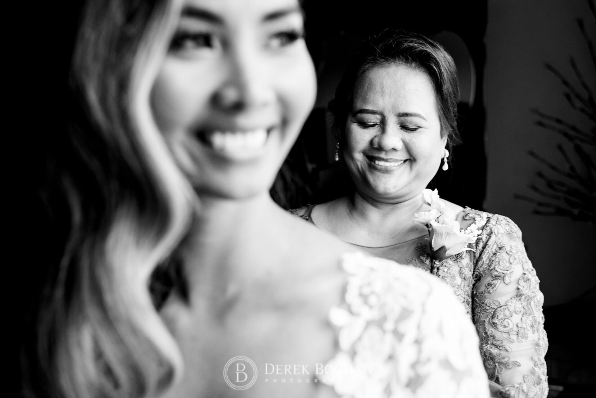 Winnipeg catholic wedding bride and her mom smiling