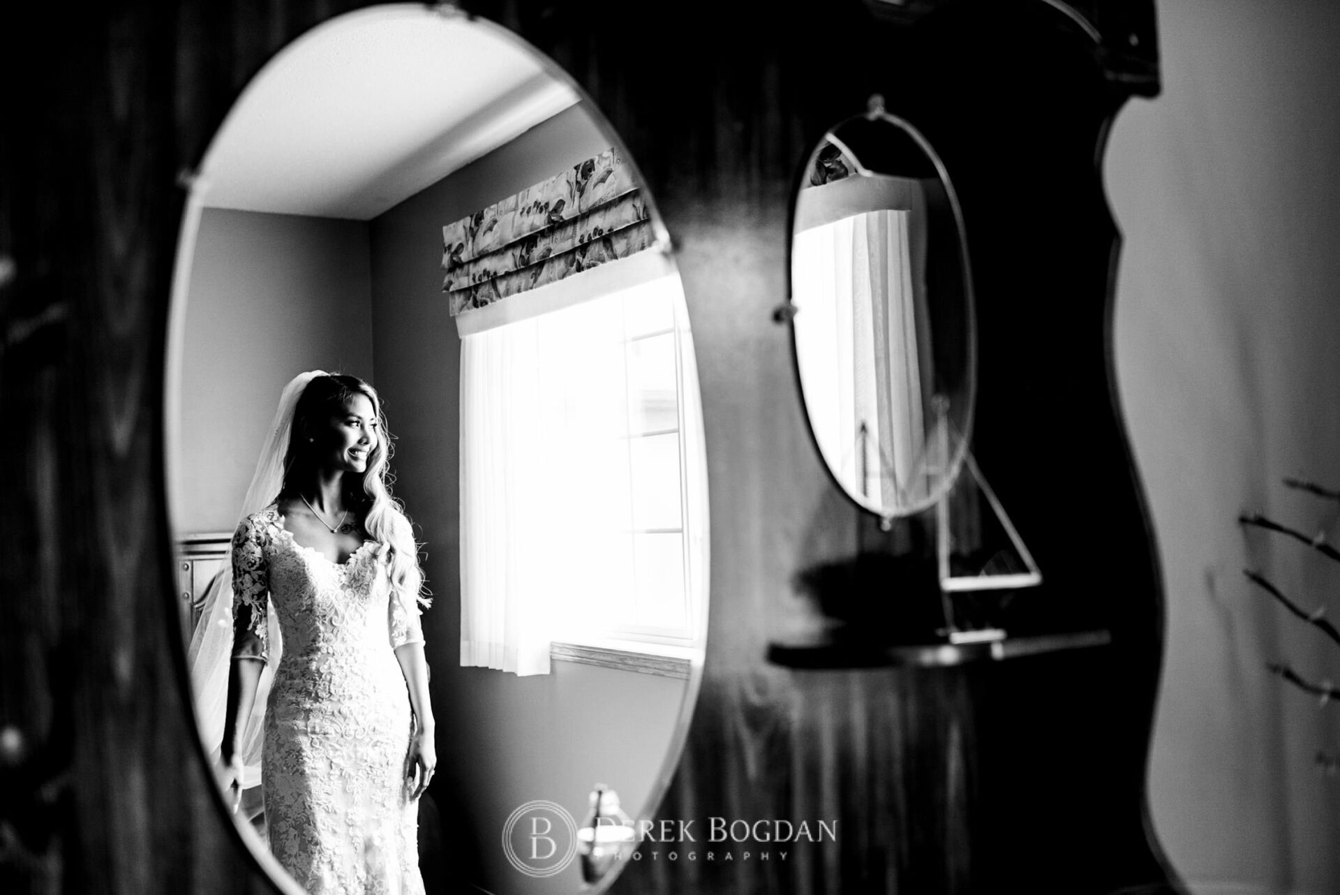 Winnipeg catholic wedding bride looking into mirror