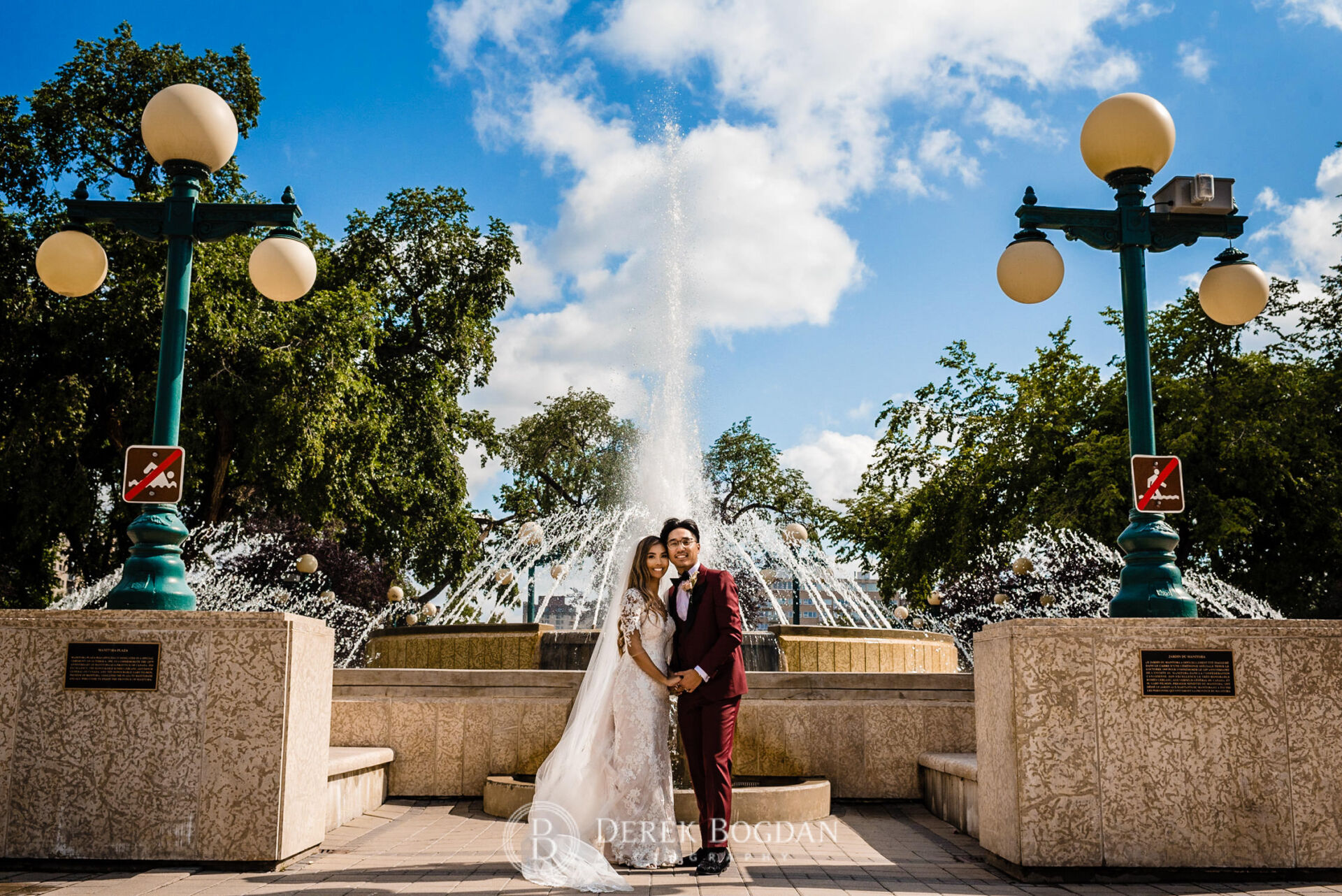 Winnipeg catholic wedding bridal portrait Legislative grounds bride groom fountain